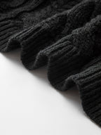 Ribbed edge of cable knit cardigan with bow-knot accent, textured knit and wavy hem.