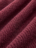 Burgundy ribbed cardigan with lace trim, soft fibers, tie-front bow, diagonal ridges.