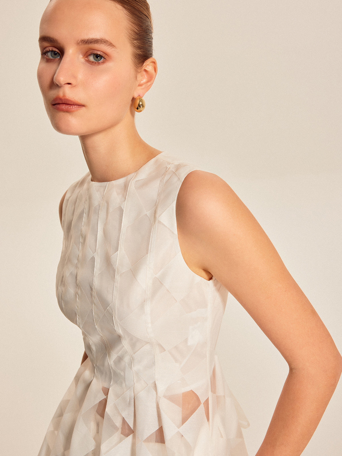Semi-Sheer Geometric Peplum Top with Delicate Lace Detail