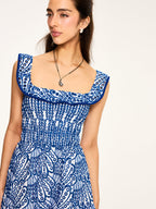 Semi-Sheer Embroidered Maxi Dress with Ruffled Trim and Floral Detailing