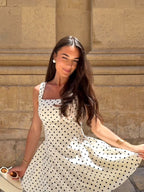 Polka Dot Lace-Up Back Dress with Flared Skirt Detail